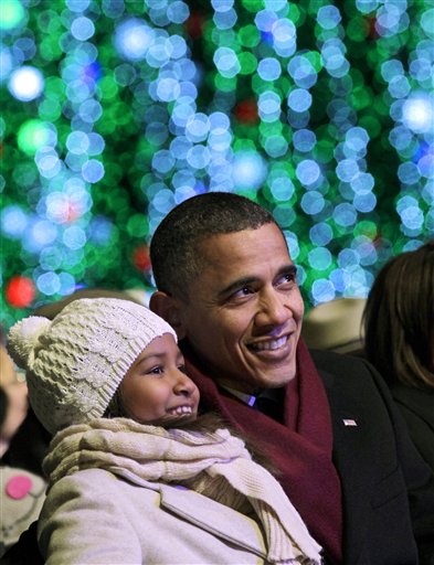 barack obama family tree. President Barack Obama smiles