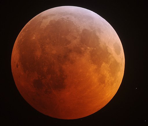 moon phases 2011 north america. The eclipsed moon glows in the