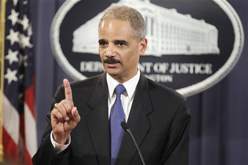 
 Attorney General Eric Holder answers a question about WikiLeaks during a news conference at the Justice Department in Washington, Monday, Nov. 29, 2010. (AP Photo/Charles Dharapak)
 