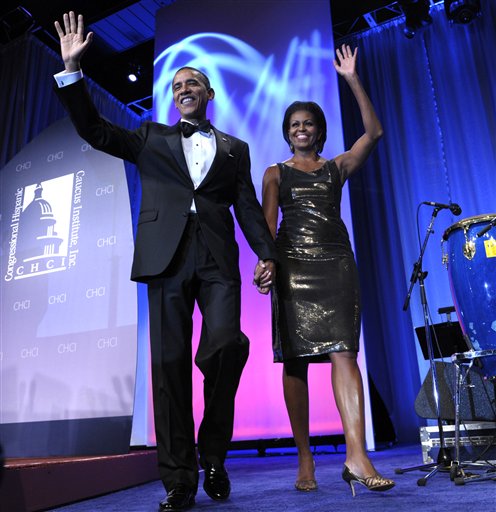 
 President Barack Obama and first lady Michelle Obama arrive at the Congressional Hispanic Caucus Institute's 33rd Annual Awards Gala at the Washington Convention Center in Washington, Wednesday, Sept. 15, 2010. (AP Photo/Susan Walsh)
 