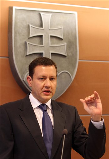 
 Daniel Lipsic, Slovak Minister of the Interior, speaks during a news conference in Bratislava, Slovakia, on Tuesday, Aug. 31, 2010. A suspicious package found near the same place where a heavily armed man killed seven people and himself on Monday, did not contain any explosives and turned out to be harmless, Slovak police said. (AP Photo/Ronald Zak)
 