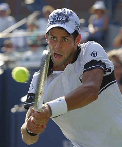 
 Andy Roddick of the United States returns a shot to Stephane Robert of France during the first round of the U.S. Open tennis tournament in New York, Monday, Aug. 30, 2010. Roddick won his opening match on his 28th birthday. (AP Photo/Kathy Willens)
 