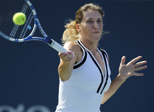 
 Kim Clijsters of Belgium applauds the crowd after she won her match against Greta Arn of Hungary during the first round of the U.S. Open tennis tournament in New York, Monday, Aug. 30, 2010. Clijsters won the match 6-0, 7-5. (AP Photo/Kathy Willens)
 