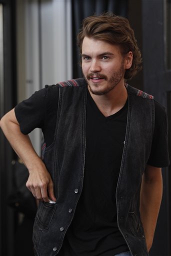 Actor Emile Hirsch poses during...