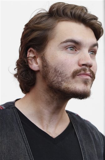 Actor Emile Hirsch poses during...