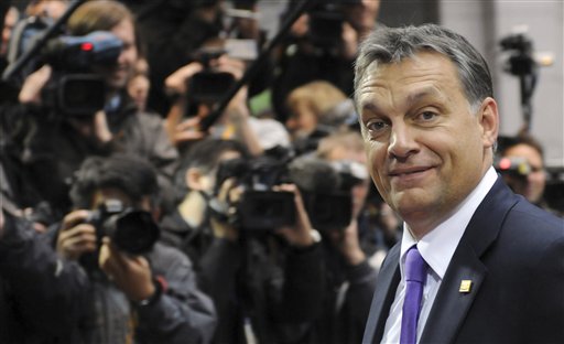 
 FILE - In this Oct. 28, 2010 file photo, Hungarian Prime Minister Viktor Orban arrives for a EU summit in Brussels, Belgium. Hungary's democratic credentials are under scrutiny as it prepares to assume the EU presidency Saturday, with some critics accusing its leadership of creeping authoritarianism more suited to Belarus than Budapest. (AP Photo/Thierry Charlier, File)
 
