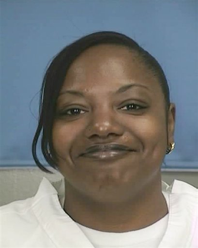 
 FILE - This is a June 17, 2010 file photograph released by the Mississippi Department of Corrections of Gladys Scott who, along with her sister Jamie Scott had their life sentences for robbery suspended Wednesday, Dec. 29, 2010 by Mississippi Gov. Haley Barbour. The two women were convicted in 1994 for their roles in an armed robbery that netted $11. Barbour said in a news release that 36-year-old Gladys Scott's release is conditioned on her donating one of her kidneys to her sister, who now requires daily dialysis. (AP Photo/Mississippi Department Of Corrections)
 