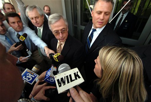 
 Sandy Fonzo of Wilkes-Barre, right, confronts former Luzerne County Judge Mark A. Ciavarella Jr., as he leaves the federal courthouse in Scranton Pa. after being convicted of racketeering on Friday, Feb. 18, 2011 in Scranton, Pa. Federal prosecutors accused Ciavarella, a former juvenile court judge, and a second judge, Michael Conahan, of taking more than $2 million in bribes from the builder of the PA Child Care and Western PA Child Care detention centers and extorting hundreds of thousands of dollars from the facilities' co-owner. Ciavarella insisted the payments were legal and denied that he incarcerated youths for money. A federal jury in Scranton returned a mixed verdict, convicting Ciavarella of 12 counts, including racketeering and conspiracy, and acquitting him of 27 counts, including extortion. The guilty verdicts related to nearly $1 million that the builder paid to the judges. (AP Photo/The ScrantonTimes-Tribune, Butch Comegys)
 