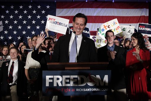 
 Republican presidential candidate, former Pennsylvania Sen. Rick Santorum, laughs as he answers questions from the media in West Bend, Wis., Sunday, April 1, 2012. (AP Photo/Jae C. Hong)
 