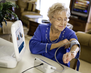 Intel Health Guide in Use to Record Blood Pressure Data