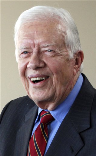 
 FILE - In an Aug. 31, 2010 file photo, former President Jimmy Carter leaves the State Department in Washington. An airport spokeswoman in Cleveland says former President Jimmy Carter has been hospitalized. (AP Photo/Manuel Balce Ceneta, File)
 