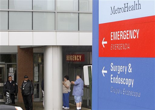 
 Security guards stand outside the front entrance of MetroHealth Hospital, Tuesday, Sept. 28, 2010, in Cleveland. Former President Jimmy Carter, on a trip promoting his new book, developed an upset stomach on a flight to Cleveland and was taken to the hospital for observation, officials said. (AP Photo/Tony Dejak)
 