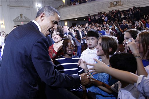 
 FILE - In this Sept. 14, 2010 file photo, President Barack Obama shakes hands with students after delivering remarks at his second annual back-to-school speech, at Julia R. Masterman School in Philadelphia. Obama's call for a longer school day and year for America's kids echoes a similar call he made a year ago to little effect, illustrating just how deeply entrenched the traditional school calendar is and how little power the federal government has to change it. (AP Photo/Pablo Martinez Monsivais, File)
 