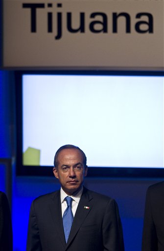 
 Mexico's President Felipe Calderon attends the opening ceremony of the Tijuana Innovate festival in Tijuana, Mexico, Thursday Oct. 7, 2010. The two-week $5 million festival in the border city across from San Diego aims to showcase the city's economic prowess and cultural riches in an effort to demonstrate the city is no longer in the grip of warring drug traffickers. (AP Photo/Guillermo Arias)
 
