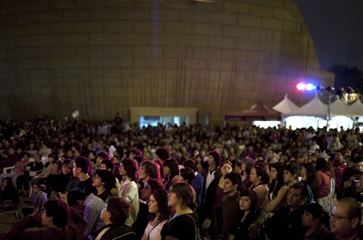 
 In this Oct. 3, 2010 photo, people attend a concert at Tijuanarte Art Festival in Tijuana, Mexico. A two-week $5 million festival called Innovative Tijuana starts Thursday Oct. 7, 2010 in the border city across from San Diego and aims to showcase the city's economic prowess and cultural riches in an effort to demonstrate the city is no longer in the grip of warring drug traffickers. (AP Photo/Guillermo Arias)
 