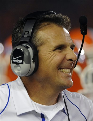 
 Florida head coach Urban Meyer grimaces as he looks up at the scoreboard during the first half of an NCAA college football game against LSU in Gainesville, Fla., Saturday, Oct. 9, 2010.(AP Photo/Phil Sandlin)
 