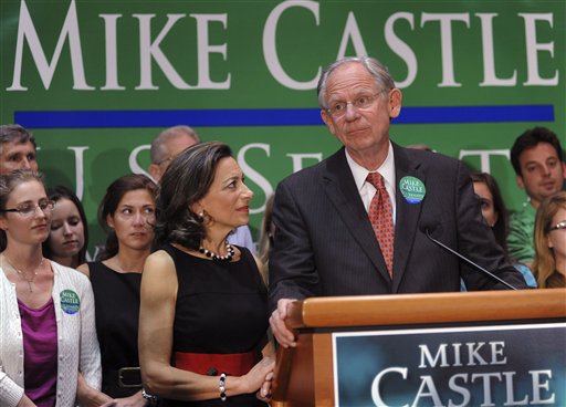 
 FILE - In this Sept. 14, 2010, file photo, Rep. Mike Castle, R-Del., joined by his wife Jane, center, addresses supporters after his defeat in a primary in Wilmington, Del. Castle has ruled out a write-in campaign in the U.S. Senate race. (AP Photo/Steve Ruark, file)
 