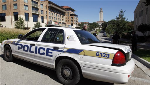 
 Police block of the University of Texas campus where a gunman opened fire then killed himself inside a library, Tuesday, Sept. 28, 2010 in Austin. The UT clock tower is seen in the background. (AP Photo/Eric Gay)
 