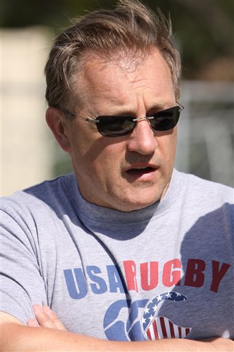 
 FILE - In this June 8, 2009, file photo, photo provided by the U.S. Rugby Association, U.S. Rugby coach Eddie O'Sullivan talks to the media before practice for the Churchill Cup in Commerce City, Colo. Though injury rates in rugby are as high or higher than those in American football, there has never been a push to bring helmets and heavy padding into the game. *AP Photo/U.S.Rugby, J.D. Black) ** NO SALES **
 