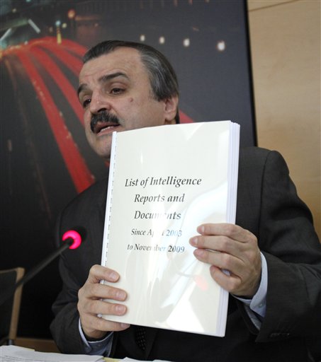 
 Chairman of the Foreign Affairs Committee of the National Council of Resistance of Iran, Mohammad Mohaddessin, holds up documents he claims relate to Iran's meddling in Iraq during a media conference in Brussels, Tuesday, Oct 26, 2010. Documents posted by WikiLeaks last week recount Iran's alleged role in arming and training Shiite militias in Iraq, where Tehran has also sought to influence politics. Iran denies these charges.(AP Photo/Virginia Mayo)
 