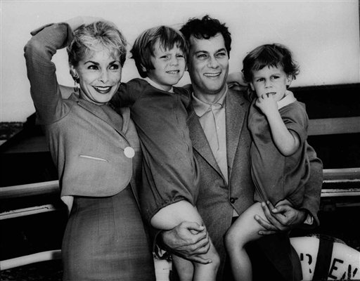 
 FILE - Tony Curtis and Janet Leigh pose with their children, Kelly 5, and Jamie, 2 1/2 in this Sept. 19,1961 file photo prior to their departure on the SS Argentina for the Argentine where Curtis was to do location filming for the movie 'Taras Bulba.' Curtis died Wednesday Sept. 29, 2010 at his Las Vegas area home of a cardiac arrest at 85 according to the Clark County, Nev. coroner. (AP Photo/HO - File)
 