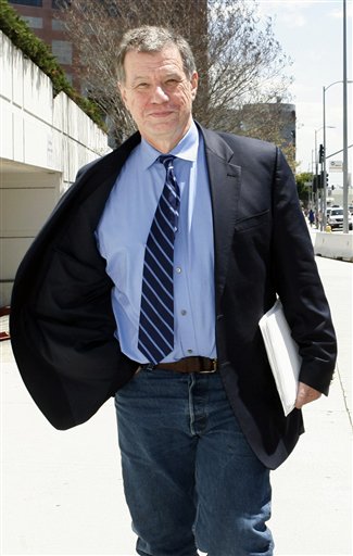 
 ** FILE ** In this April 17, 2006 file photo, John McTiernan, director of such hit movies as 'Die Hard' and 'The Thomas Crown Affair,' leaves federal court in Los Angeles. McTiernan was sentenced in Federal court Monday, Oct. 4, 2010 to one year in prison and $100,000 fine for lying during a Hollywood wiretapping investigation of private investigator Anthony Pellicano. (AP Photo/Nick Ut, File)
 