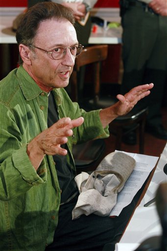 
 Missing hiker Ed Rosenthal gestures during a news conference while explaining his ordeal of being lost inside Joshua Tree National Park, Tuesday Oct. 5, 2010 in Los Angeles. (AP Photo/Damian Dovarganes)
 