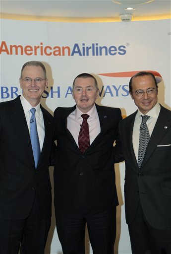 
 Launching a new transatlantic air business, are from left to right, CEOs of American Airlines' Gerard Arpey, British Airways' Willie Walsh and Iberia's Antonio Vazquez, pose for the photographers prior to a news conference to announce the launch of their transatlantic joint business, in central London, Wednesday Oct. 6, 2010. (AP Photo/Lefteris Pitarakis)
 