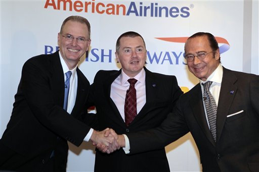 
 Launching a new transatlantic air business, are from left to right, CEOs of American Airlines' Gerard Arpey, British Airways' Willie Walsh and Iberia's Antonio Vazquez, as they pose for the photographers prior to a news conference to announce the launch of their transatlantic joint business, in central London, Wednesday Oct. 6, 2010. (AP Photo/Lefteris Pitarakis)
 