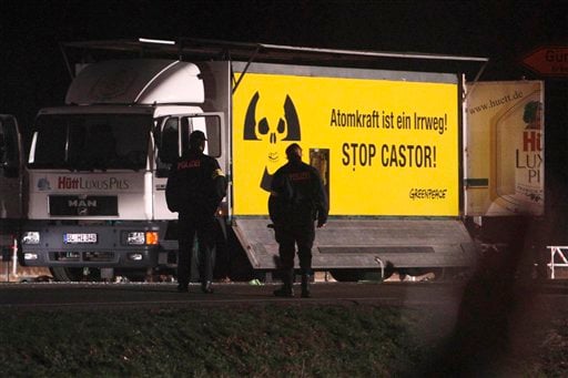 
 A truck of environmental organization Greenpeace blocks a road junction in Dannenberg, northern Germany, Monday, Nov. 8, 2010, prior to a road shipment of nuclear waste reaching them. The truck is adapted with flaps to prevent it from being moved. The shipment of nuclear waste from France eventually made it to a storage facility in northwestern Germany on Tuesday, after police worked through the night to clear a road blockade by more-than 3,000 protesters. (AP Photo/Michael Probst)
 