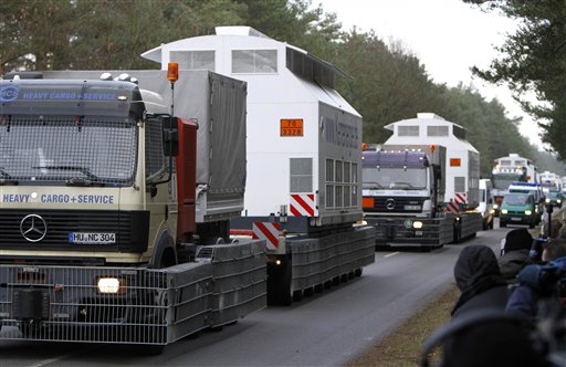 
 Flatbed trailer carrying Castors with nuclear waste arrive at the nuclear interim storage facility in Gorleben, Germany, Tuesday, Nov. 9, 2010. A shipment of nuclear waste from France made it to a storage facility in northwestern Germany on Tuesday, after police worked through the night to clear a road blockade by more-than 3,000 protesters. (AP Photo/Ferdinand Ostrop)
 