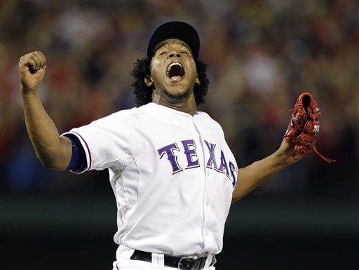 
 FILE-This Oct. 22, 2010 file photo shows Texas Rangers relief pitcher Neftali Feliz celebrating after striking out New York Yankees' Alex Rodriguez for the final out in the Rangers' 6-1 win in Game 6 of baseball's American League Championship Series in Arlington, Texas. Feliz was named American League Rookie of the Year by the Baseball Writers' Association of America Monday Nov. 15, 2010. (AP Photo/Chris O'Meara,File)
 
