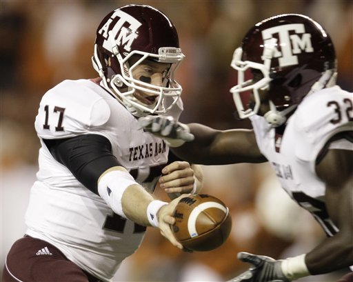 
 Texas A&M's Ryan Tannehill (17) hands off to Cyrus Gray (32) during the first quarter of an NCAA college football game against Texas, Thursday, Nov. 25, 2010, in Austin, Texas. (AP Photo/Eric Gay)
 