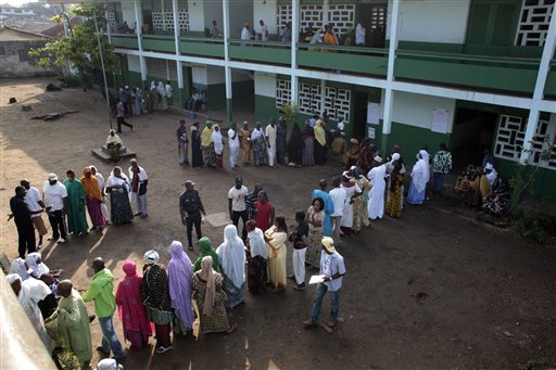 
 Voters wait in line to cast their ballot in the first round of presidential elections in Abidjan, Ivory Coast, Sunday Nov. 31, 2010. The West African nation of Ivory Coast held a long-awaited presidential election Sunday, the first since civil war erupted in 2002 and split the world's leading cocoa producer in half. Millions of people here are hoping the repeatedly delayed poll will reunite the divided country and restore stability after more than a decade of chaos and tension(AP Photo/Jerome Delay)
 