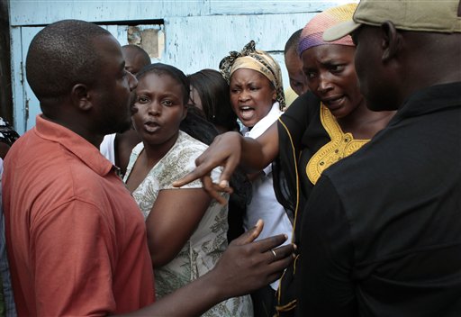 
 Voters argue as they wait in line to cast their ballot in the first round of presidential elections in Abidjan, Ivory Coast, Sunday Nov. 31, 2010. The West African nation of Ivory Coast held a long-awaited presidential election Sunday, the first since civil war erupted in 2002 and split the world's leading cocoa producer in half. Millions of people here are hoping the repeatedly delayed poll will reunite the divided country and restore stability after more than a decade of chaos and tension(AP Photo/Jerome Delay)
 