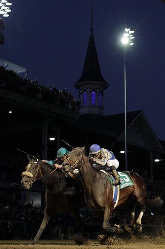 
 Garrett Gomez, right, rides Blame to victory during the Classic race at the Breeder's Cup horse races at Churchill Downs Saturday, Nov. 6, 2010, in Louisville, Ky. Mike Smith riding Zenyatta finished second. (AP Photo/Darron Cummings)
 
