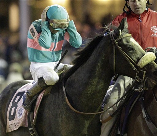 
 Garrett Gomez, right, rides Blame to victory during the Classic race at the Breeder's Cup horse races at Churchill Downs Saturday, Nov. 6, 2010, in Louisville, Ky. Mike Smith riding Zenyatta finished second. (AP Photo/David J. Phillip)
 