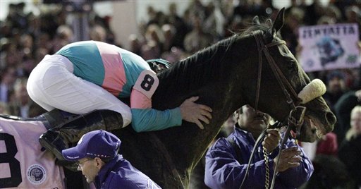 
 Mike Smith reacts after riding Zenyatta to a second place finish in the Classic race at the Breeder's Cup horse races at Churchill Downs Saturday, Nov. 6, 2010, in Louisville, Ky. (AP Photo/David J. Phillip)
 