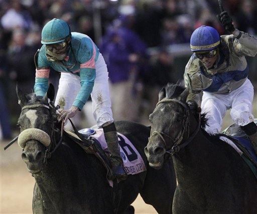 
 This image provided by Churchill Downs shows Garrett Gomez riding Blame, rear, beating Mike Smith riding Zenyatta (8) during the Classic race at the Breeder's Cup horse races at Churchill Downs Saturday, Nov. 6, 2010, in Louisville, Ky. (AP Photo/Churchill Downs) ** NO SALES **
 
