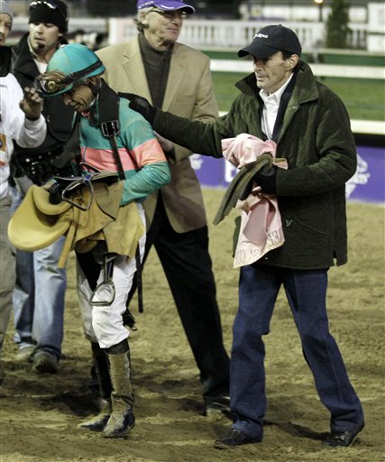
 Teresa Weekly reacts as she watches a replay of the Classic race at the Breeder's Cup horse races at Churchill Downs Saturday, Nov. 6, 2010, in Louisville, Ky. Garrett Gomez riding Blame won the race while Mike Smith riding Zenyatta finished second. (AP Photo/Darron Cummings)
 