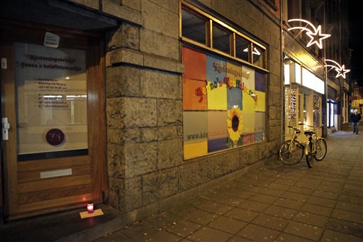 
 A lone candle with a note stands in the doorway of a daycare center in Amsterdam, Sunday Dec. 12, 2010, where a man suspected of abusing preschool children was employed. Parents of dozens of preschool children in Amsterdam have been warned their children may have been abused by a baby sitter in one of the worst sexual abuse cases to come to light in the Netherlands. Authorities say a 27-year-old suspect was arrested after a tip from U.S. authorities about child pornography. The man's computers have been seized and he has confessed to dozens of sex crimes at two Amsterdam daycare centers over the past 18 months, police chief Herman Bolhaar said at a press conference Sunday. (AP Photo/Peter Dejong)
 