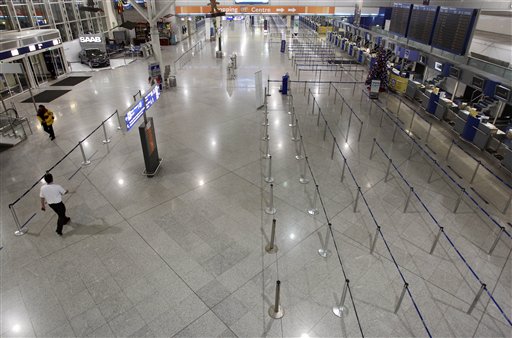 
 The Athens International Airport Eleftherios Venizelos is seen almost deserted during a 24-hour strike in Spata, near Athens, Wednesday, Dec. 15, 2010. A new general strike hit Greece Wednesday, grounding flights and disrupting hospital and transport services as unions protest against the freshly approved labor reforms amid painful austerity and rising unemployment. (AP Photo/Thanassis Stavrakis)
 
