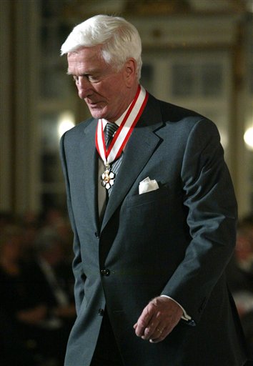 
 FILE - In this file photo taken Dec. 12, 2003, actor Leslie Nielsen walks off stage after receiving the Order of Canada from Governor General Adrienne Clarkson during a ceremony in Ottawa. The Canadian-born Nielsen, 84, has died in a Florida hospital on Sunday, Nov. 28, 2010, according to his agent John S. Kelly. (AP Photo/The Canadian Press, Jonathan Hayward, File)
 