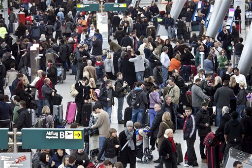 
 Passengers wait for their flights in a terminal of Duesseldorf airport, western Germany, Friday Dec. 24, 2010. According to German Dapd news agency the airport was shut down Friday for several hours due to bad weather conditions. (AP Photo/Dapd/dJakob Studnar)
 