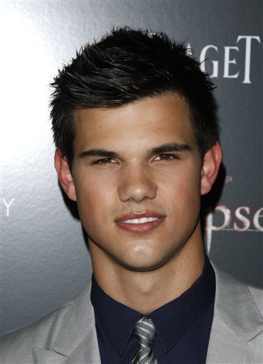 
 FILE - In this June 28, 2010 photo, Actor Taylor Lautner attends the Cinema Society premiere of 'The Twilight Saga: Eclipse' in New York. Lautner is suing an RV dealership he claims didn't deliver a customized ride in time for him to use it on his current movie shoot. The star of the 'Twillight' series sued the Irvine, Calif. dealership of McMahon's RV for more than $300,000 in Los Angeles on Monday, Aug. 23, 2010. The lawsuit claims McMahon's missed a deadline to deliver a customized 2006 Affinity Country Coach RV by June 21. (AP Photo/Peter Kramer)
 
