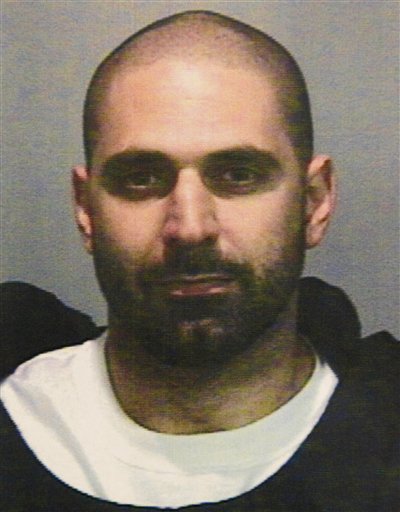 
 In this Aug. 26, 2010 photo released by the Genesee County Sheriff's Department, Elias Abuelazam is shown in Flint, Mich. Abuelazam was ordered held without bond Thursday after being extradited to Michigan. The 33-year-old is charged with assault with intent to commit murder in the July 27 stabbing of a 26-year-old Flint man. It's one of 14 stabbings, of men in the Flint area, about 70 miles northwest of Detroit. He's also suspected in similar stabbings in Virginia and Ohio. (AP Photo/Paul Sancya)
 