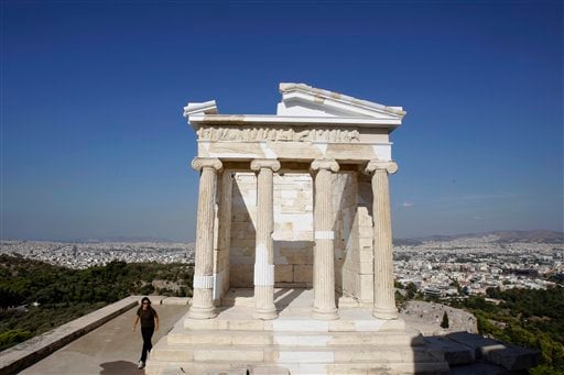 
 The elegant marble temple of Athena Nike, fronted by four slender Ionic columns, stands free of scaffolding on the Athens Acropolis, Tuesday, Sept. 7, 2010. A ten-year restoration project has just been completed on the 2,400-year-old temple, which was dismantled to ground level and rebuilt to correct damage from ground subsidence and rusting internal joints. (AP Photo/Petros Giannakouris)
 
