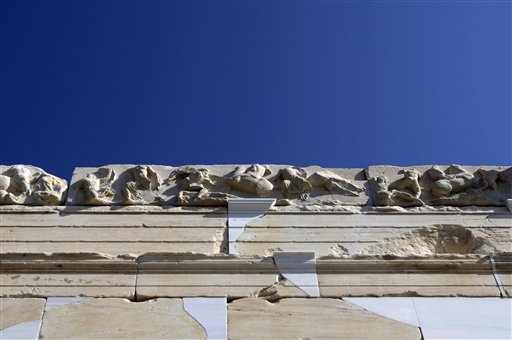 
 A copy of the original sculptured frieze is seen on the elegant marble temple of Athena Nike on the Athens Acropolis, Tuesday, Sept. 7, 2010. A ten-year restoration project has just been completed on the 2,400-year-old temple, which was dismantled to ground level and rebuilt to correct damage from ground subsidence and rusting internal joints. (AP Photo/Petros Giannakouris)
 