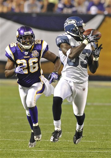 
 In this Aug. 28, 2010, file photo, Seattle Seahawks wide receiver Deion Branch, right, pulls in a pass as Minnesota Vikings cornerback Antoine Winfield (26) pursues during an NFL preseason football game in Minneapolis. Vterans Winfield and Lito Sheppard and second-year pro Asher Allen are the only three healthy cornerbacks heading into the Vikings' game against a New Orleans Saints offense that loves to run four, and sometimes even five, receivers on any given play. (AP Photo/Jim Mone, File)
 