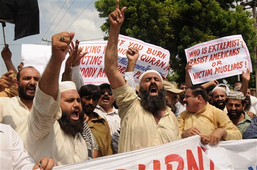 
 Pakistani protesters rally in reaction to a small American church's plan to burn copies of the Quran in Multan, Pakistan on Thursday, Sept. 9, 2010. (AP Photo/Khalid Tanveer)
 
